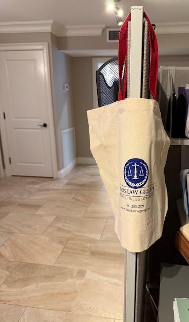 Customer photo from Jennifer of our Cotton Grocery Tote, a white bag from a metal pole