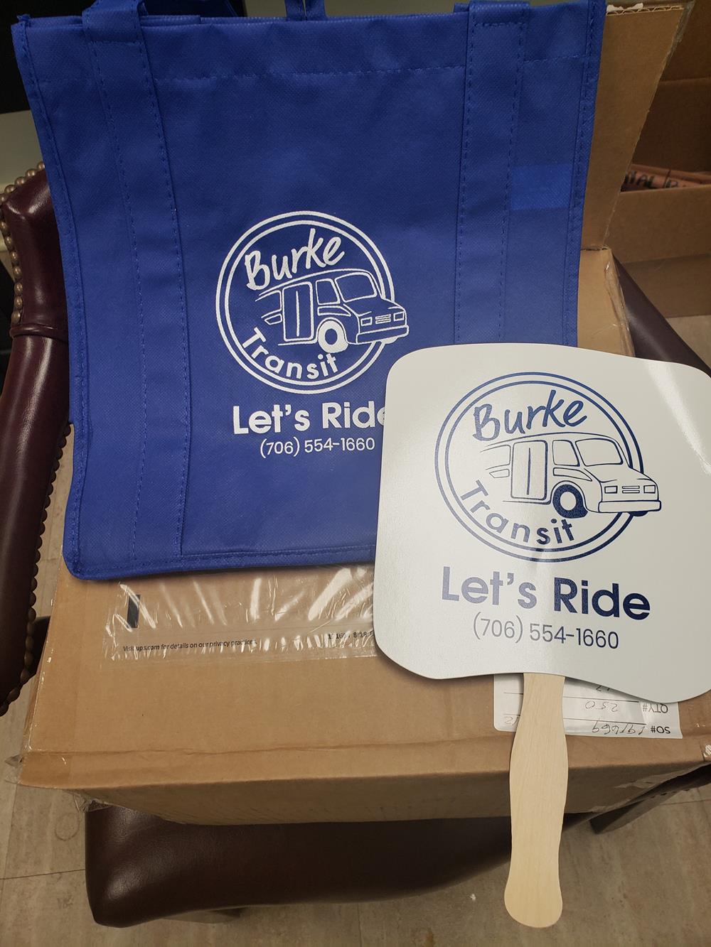 Customer photo from Christine of our Value Grocery Tote - 13" x 12", a blue and white fan next to a brown box