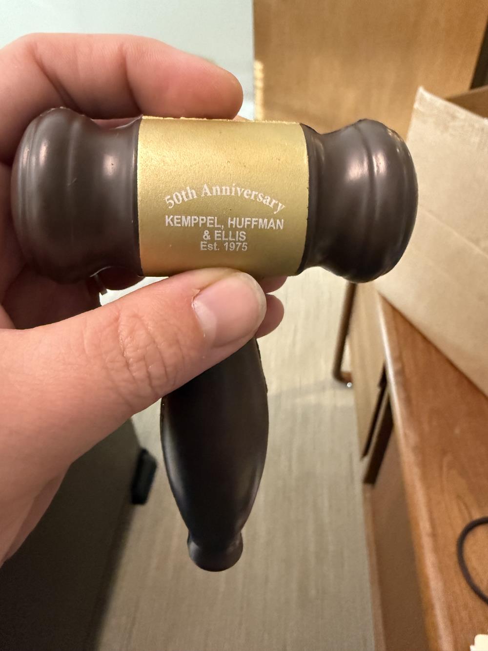 Customer photo from Becki of our Gavel Stress Reliever, a hand holding a hammer