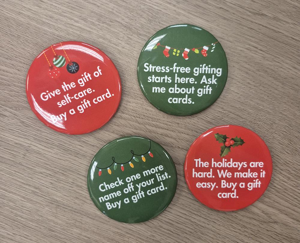 Customer photo from Carina of our Round Button - 3", a group of round badges with text on them