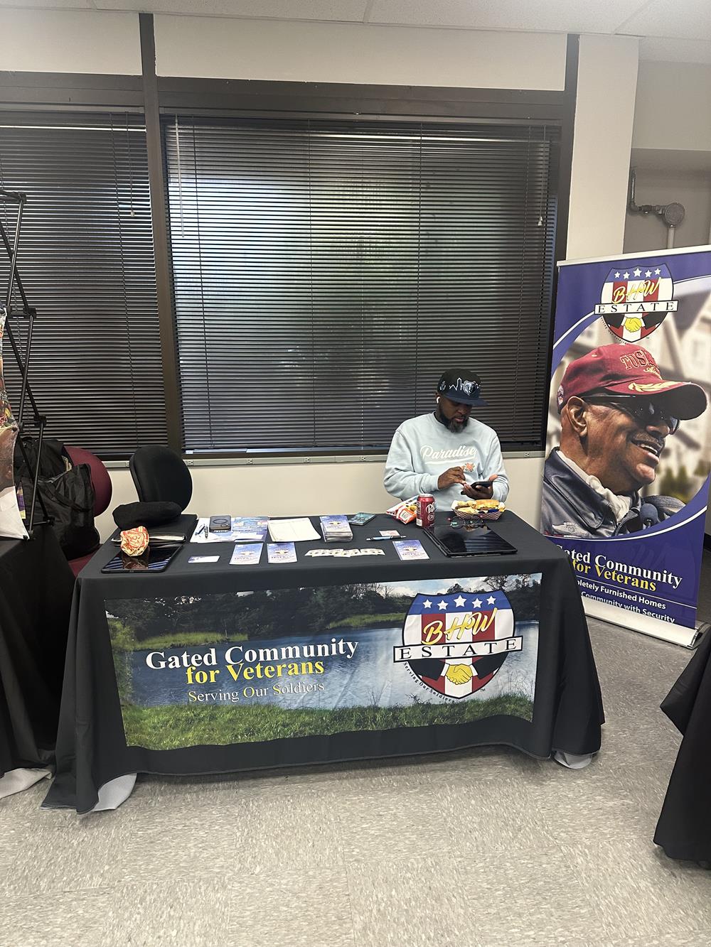 Customer photo from Debra of our Serged Closed-Back Table Throw - 6 feet, a man sitting at a table