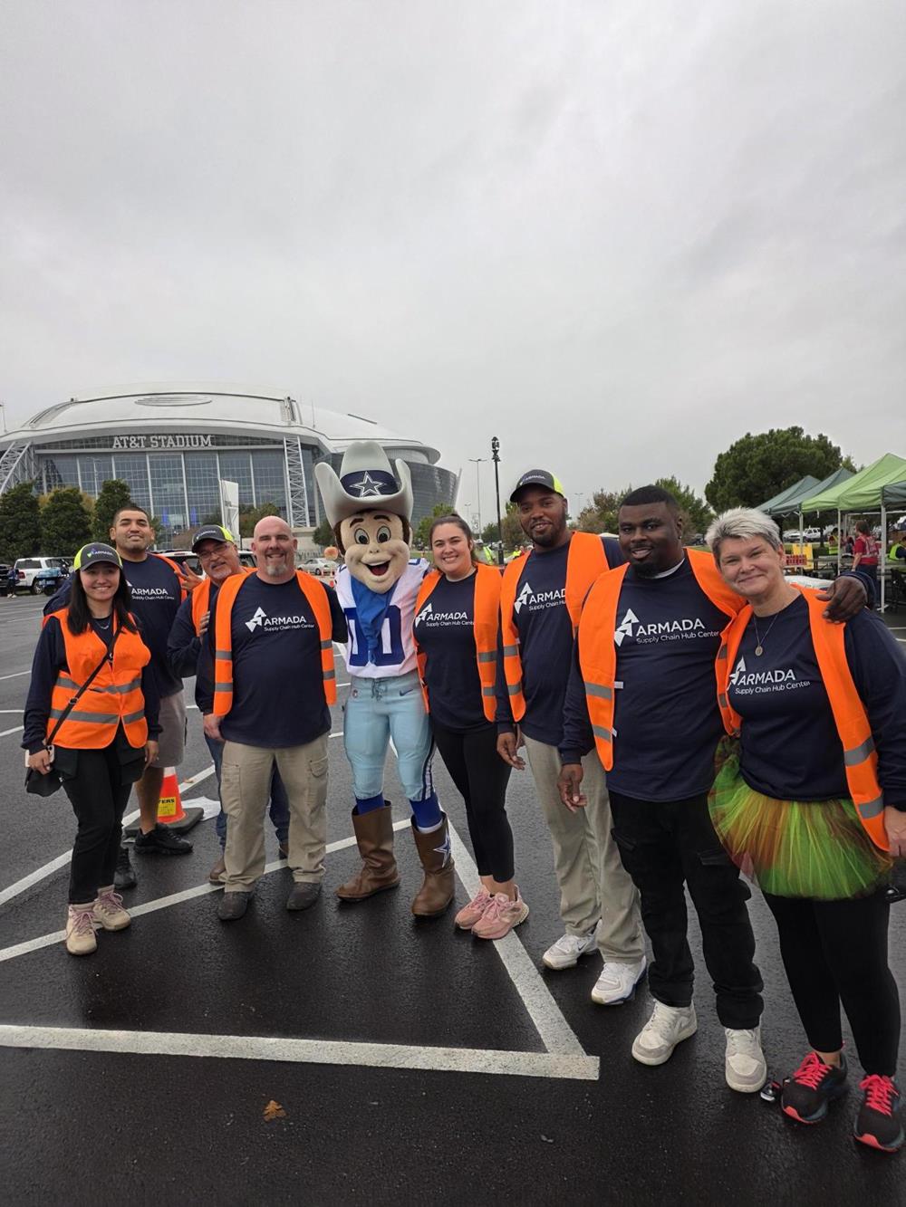 Customer photo from Julie of our Sport Stretch Performance Jacket - Men's, a group of people posing for a photo