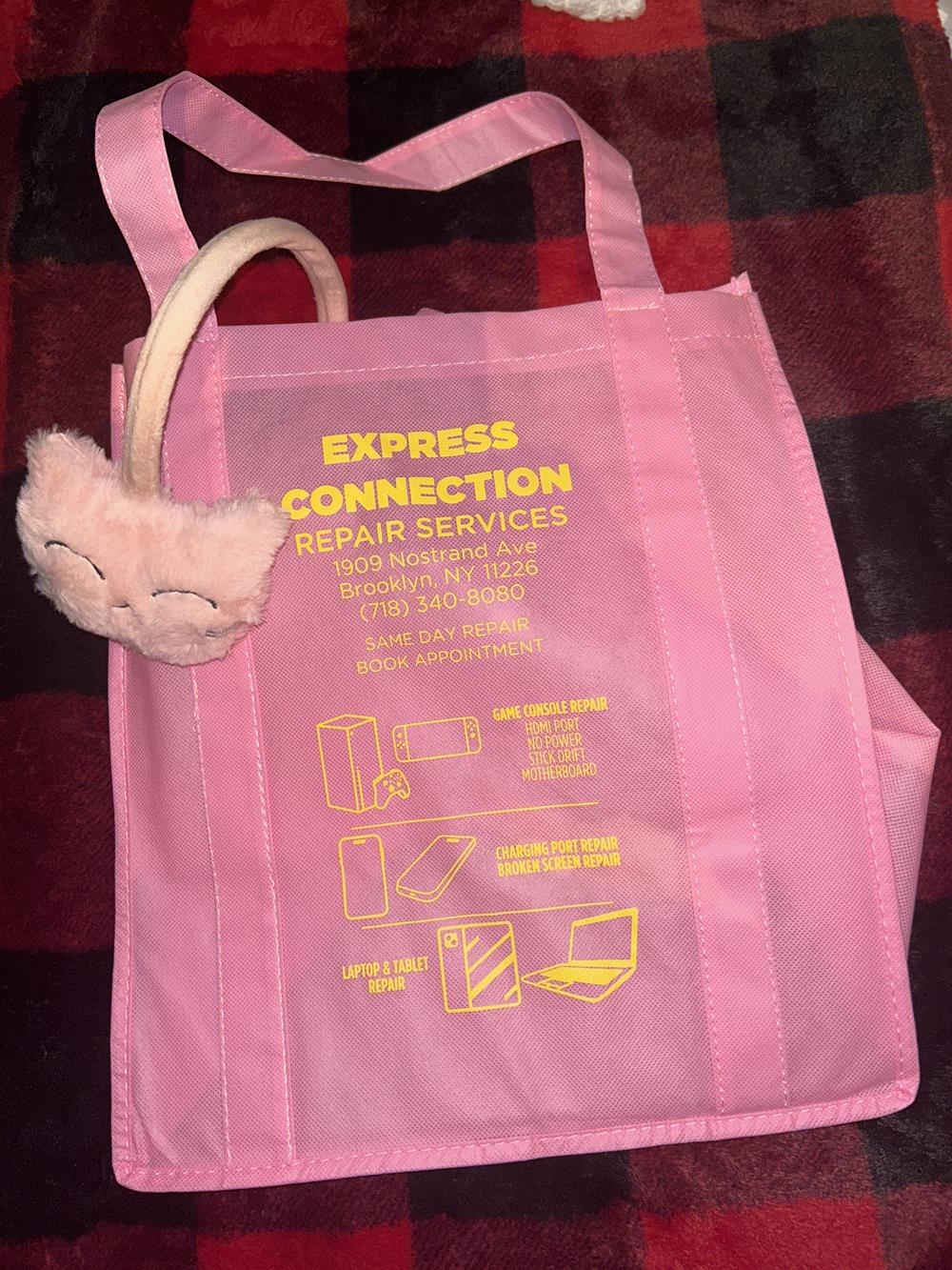Customer photo from Latina of our Value Grocery Tote - 15 inches x 13 inches, a pink bag with a cat headphone on it
