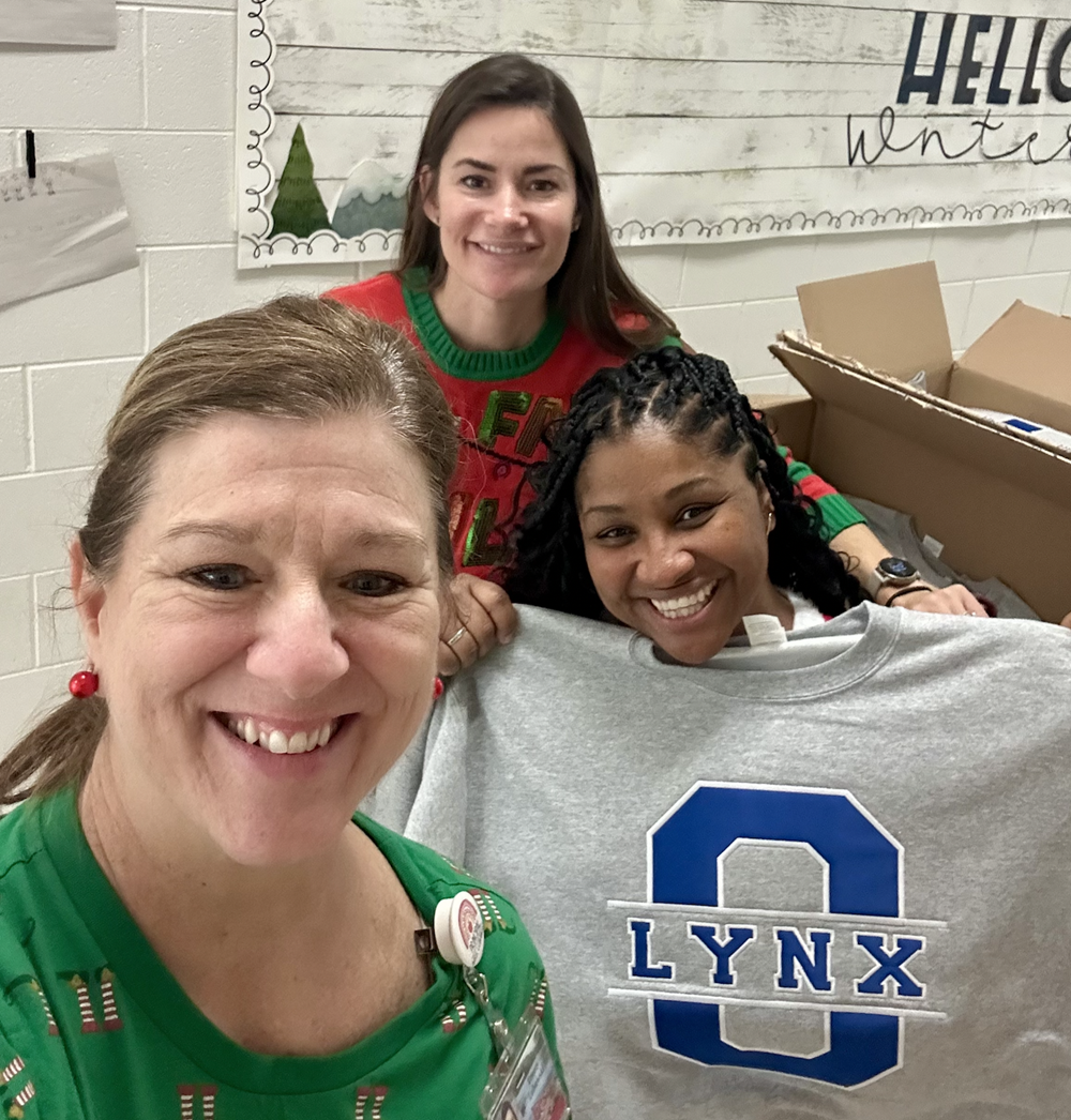 Customer photo from Tracey of our Hanes ComfortBlend Sweatshirt - Applique Twill, a group of women smiling for a photo