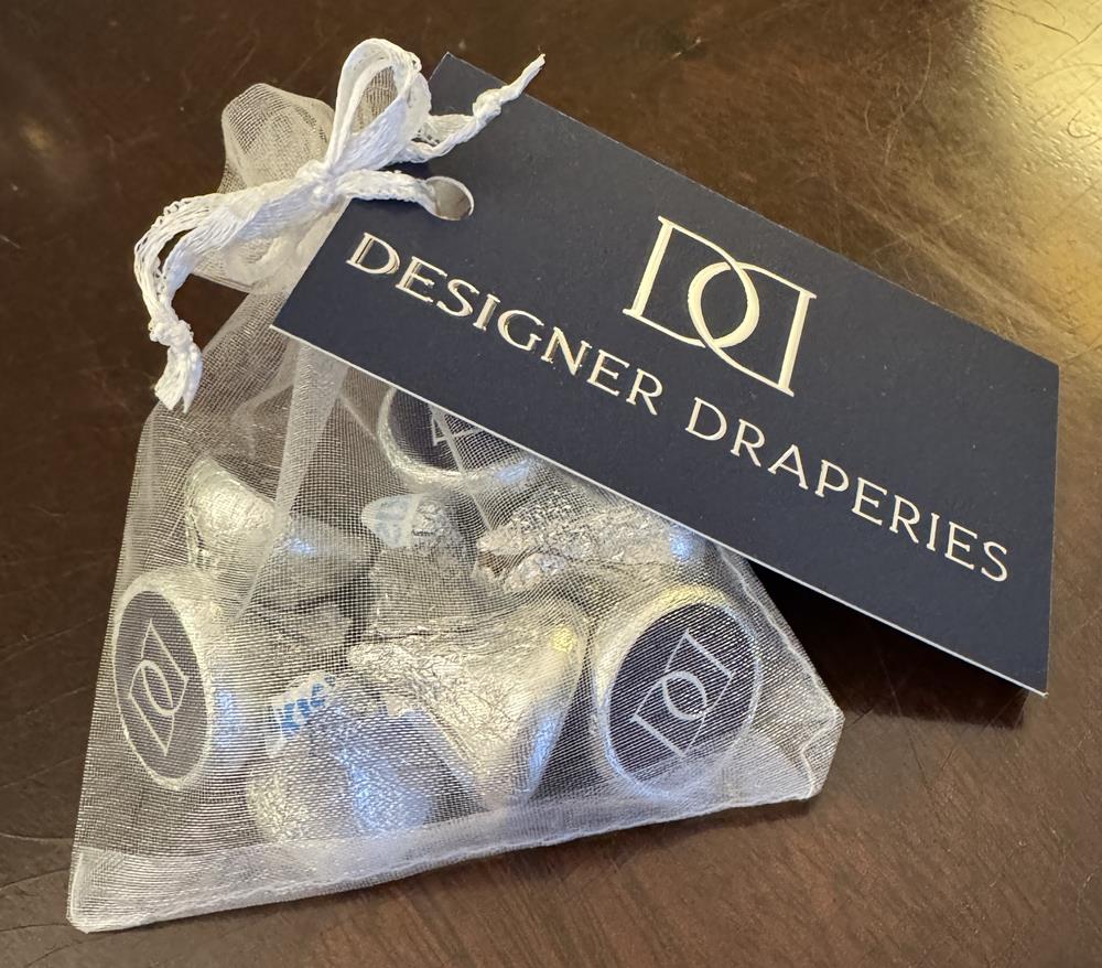 Customer photo from Debbie of our Individual Hershey's Kisses, a bag of chocolates on a table