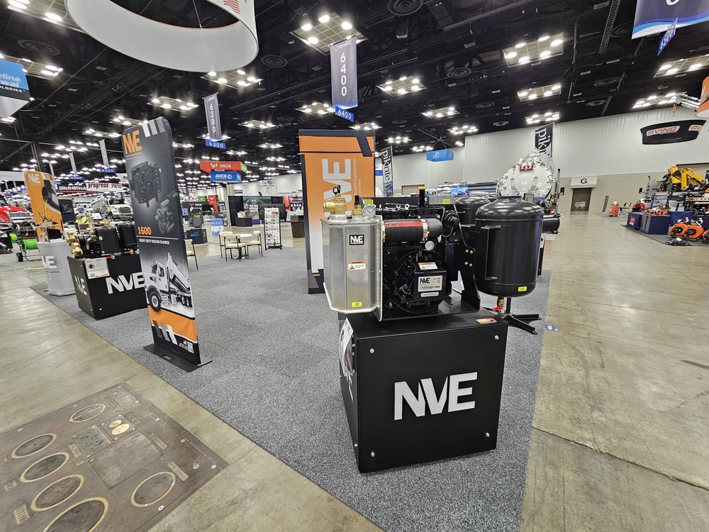 Customer photo from Jordan of our EuroFit Banner Stand - 7-1/2' x 3', a large room with several machines