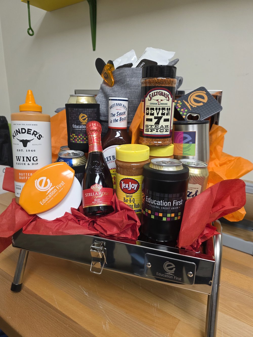Customer photo from Laura of our Stainless BBQ Grill, a gift basket with various drinks and condiments