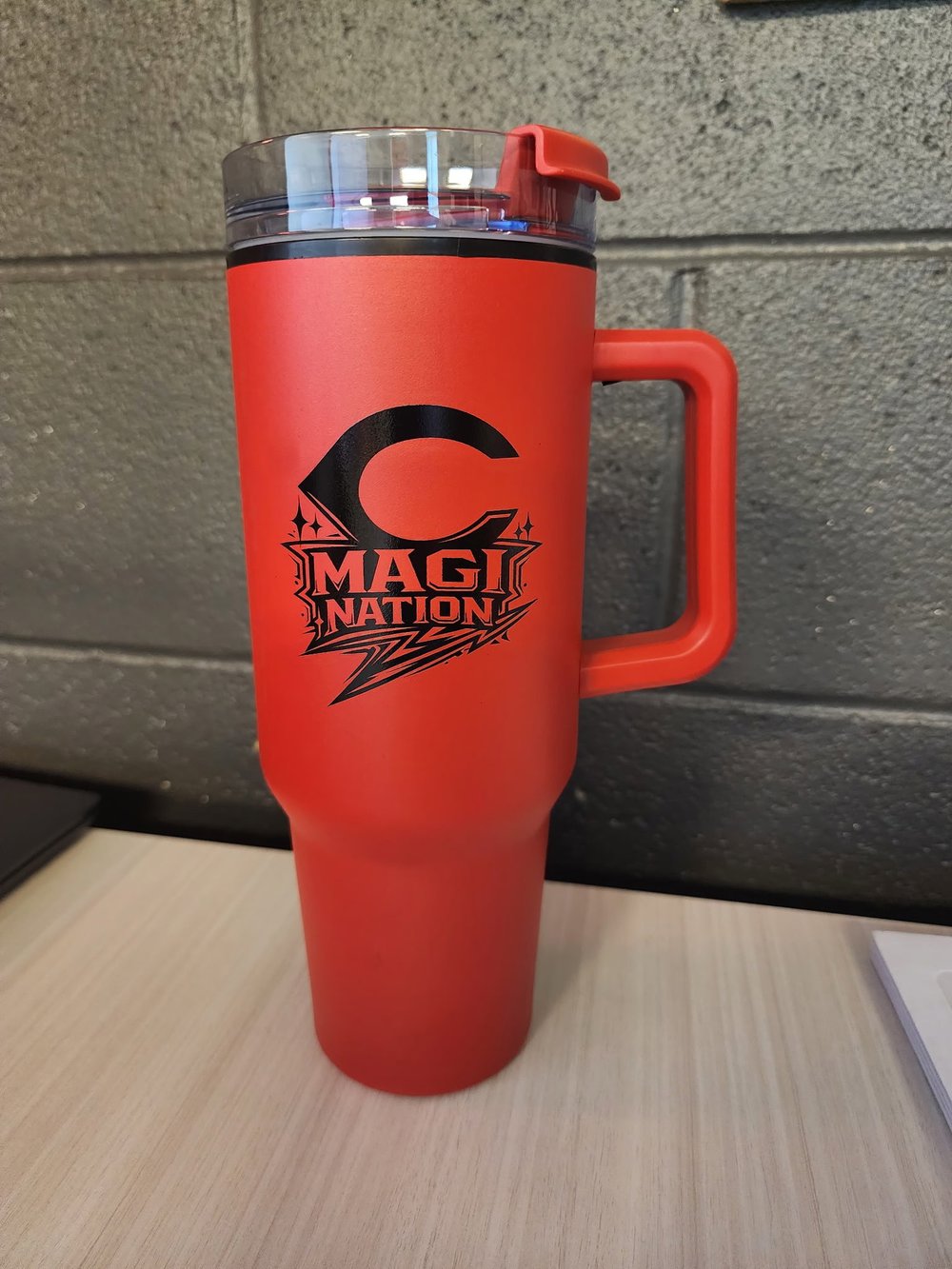 Customer photo from Olivia of our Malibu Mug with Straw - 40 oz, a red coffee mug with a handle