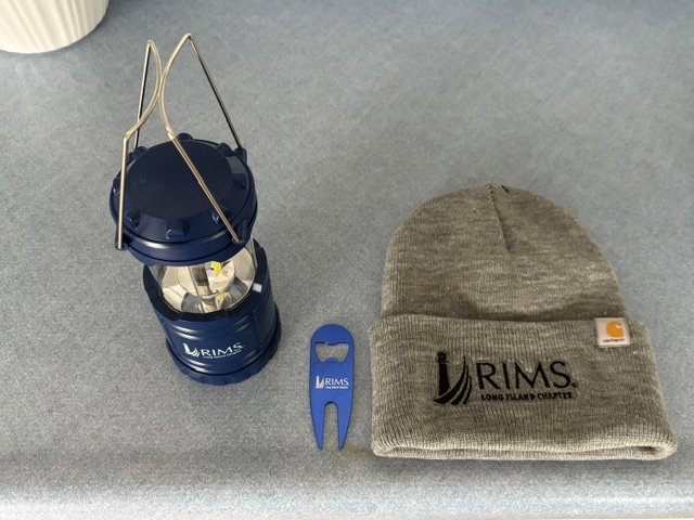 Customer photo from GREGORY of our Carhartt Acrylic Watch Hat, a hat and lantern with a bottle opener