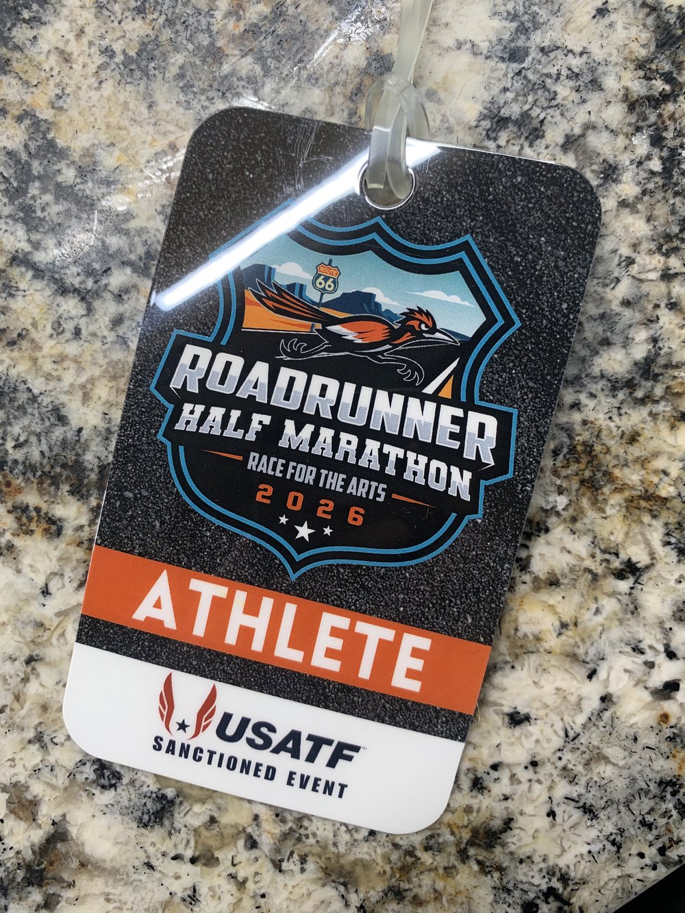 Customer photo from Keith of our Rectangle POLYspectrum Bag Tag - 3 inches x 5 inches - Translucent, a close up of a tag