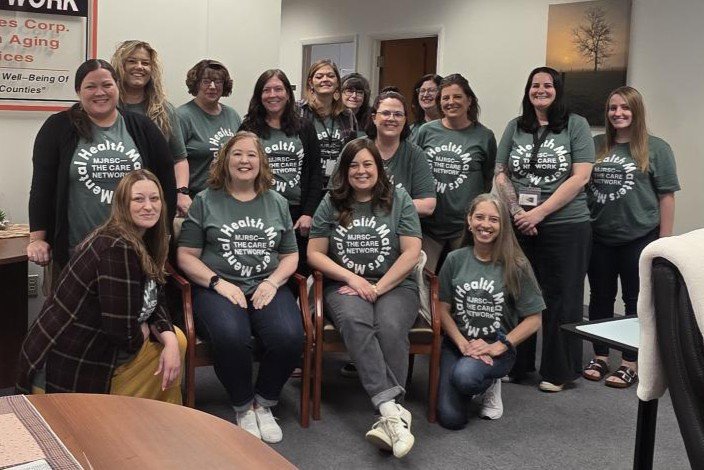 Customer photo from Roxie of our Bella+Canvas Crewneck T-Shirt - Men's - Screen, a group of women posing for a photo