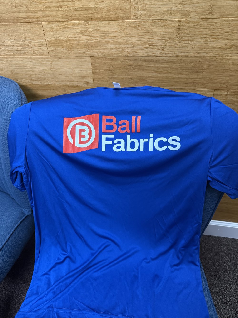 Customer photo from Ian of our Capital Performance T-Shirt - Men's, a blue shirt with white text on it