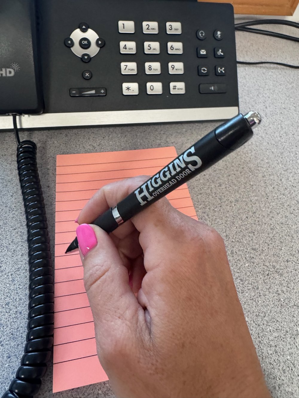 Customer photo from Robin of our Target Pen - Metallic, a hand holding a pen