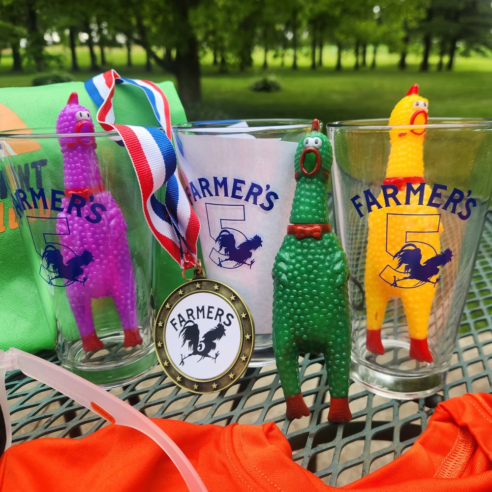 Customer photo from Amy of our Sardinia Pint Glass - 16 oz, a group of glasses with a medal and a medal on a table