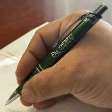 Customer photo from David of our Nautica Metal Pen, a hand holding a pen