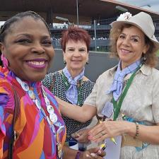 a group of women posing for a photo