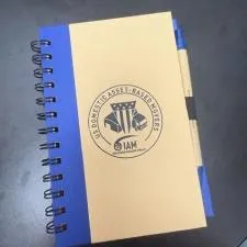 a notebook with a blue cover