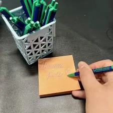 Customer photo from Aleyna of our Re-Tire Jar Opener - 5" Circle, a hand writing on a note