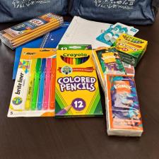 a group of school supplies on a table