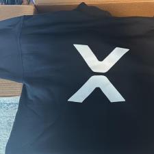 a black shirt with white x on it