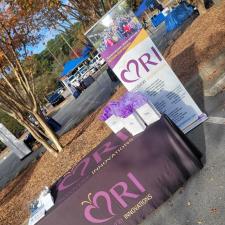 a table with purple cloth and purple ribbon on it