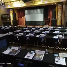 Customer photo from Kristy of our The North Face Stalwart Backpack, a room with tables and chairs