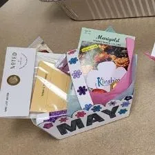 Customer photo from Kari of our Seed Paper Shapes - Flower, baskets with different items in them