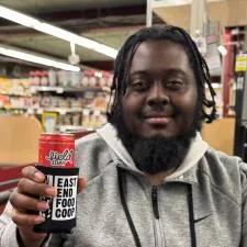 Customer photo from Jeff of our Koozie® Chill Collapsible Can Cooler, a man holding a can of soda