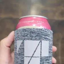 Customer photo from Anna of our Koozie® Heather Collapsible Can Cooler, a hand holding a can