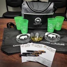 Customer photo from Brandon of our Alamo Pen - Black - Translucent, a bag with green cups and pens on a table