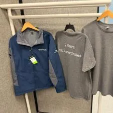 Customer photo from Rhonda of our Crossland Colorblock Soft Shell Jacket - Men's, a group of t-shirts on swingers