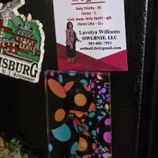 Customer photo from Lavolya of our Business Card Magnet - 20 mil - 24 hr, a magnets on a black surface