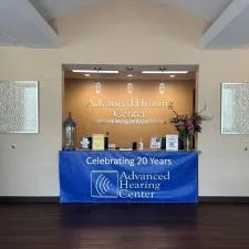 Customer photo from Terry of our Vinyl Banner with Rope on Corners - 3' x 8', a sign on a wall
