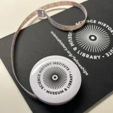 Customer photo from Charlotte of our Refresh Metairie Aluminum Bottle - 25 oz. - Laser Engraved, a tape measure on a black paper