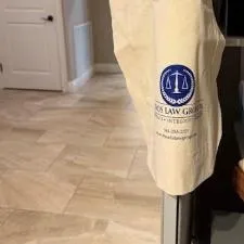 Customer photo from Jennifer of our Cotton Grocery Tote, a white bag from a metal pole