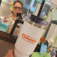 Customer photo from EILEEN of our Intrepid Vacuum Mug with Straw - 40 oz., a person holding a white water bottle