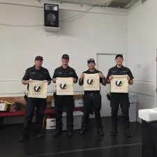 Customer photo from Cynthia of our Cotton Sheeting Natural Economy Tote - 15 1/2 inches x 15 inches - Full Color, a group of men holding signs