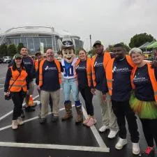 Customer photo from Julie of our Artisan Colors Bib Apron - Colors, a group of people posing for a photo