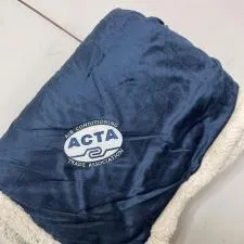 Customer photo from Becky of our Tempe Coffee Mug - 14 oz., a blue blanket on a table