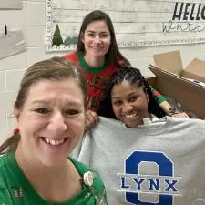 Customer photo from Tracey of our Hanes ComfortBlend Sweatshirt - Applique Twill, a group of women smiling for a photo