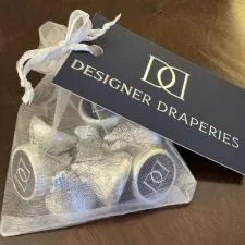 Customer photo from Debbie of our Full Color Sticker by the Roll - Circle - 1 inch, a bag of chocolates on a table
