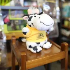 Customer photo from Jody of our Bean Bag Buddy - Cow, a stuffed cow on a chair