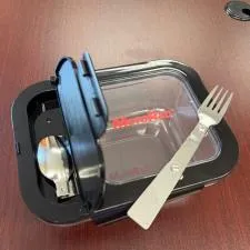 Customer photo from Katelyn of our Glass Bento Box, a fork and spoon in a plastic container