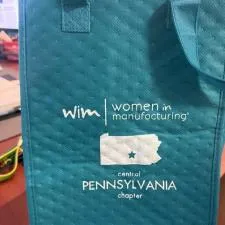 Customer photo from Karla of our Therm-O Snack Insulated Bag, a blue bag with white text on it