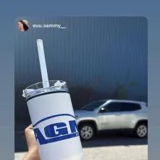 Customer photo from POLYANA O of our Malibu Mug with Straw - 30 oz - 24 hr, a hand holding a white cup with a straw