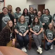 Customer photo from Roxie of our Bella+Canvas Crewneck T-Shirt - Men's - Screen, a group of women posing for a photo