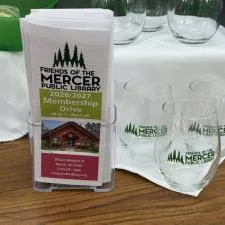 Customer photo from Julia of our Sardinia Stemless Wine Glass - 15 oz, a group of glasses on a table