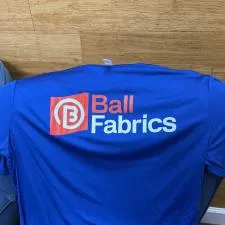 Customer photo from Ian of our Capital Performance T-Shirt - Men's, a blue shirt with white text on it